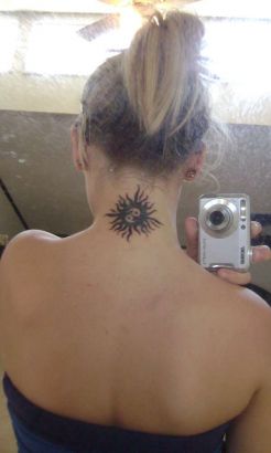 Tribal Sun Tattoo On Neck